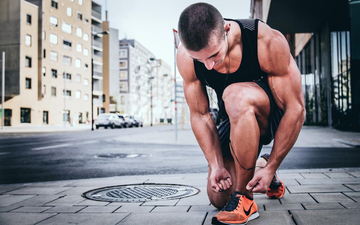 Active man demonstrating strength and vitality from healthy supplementation